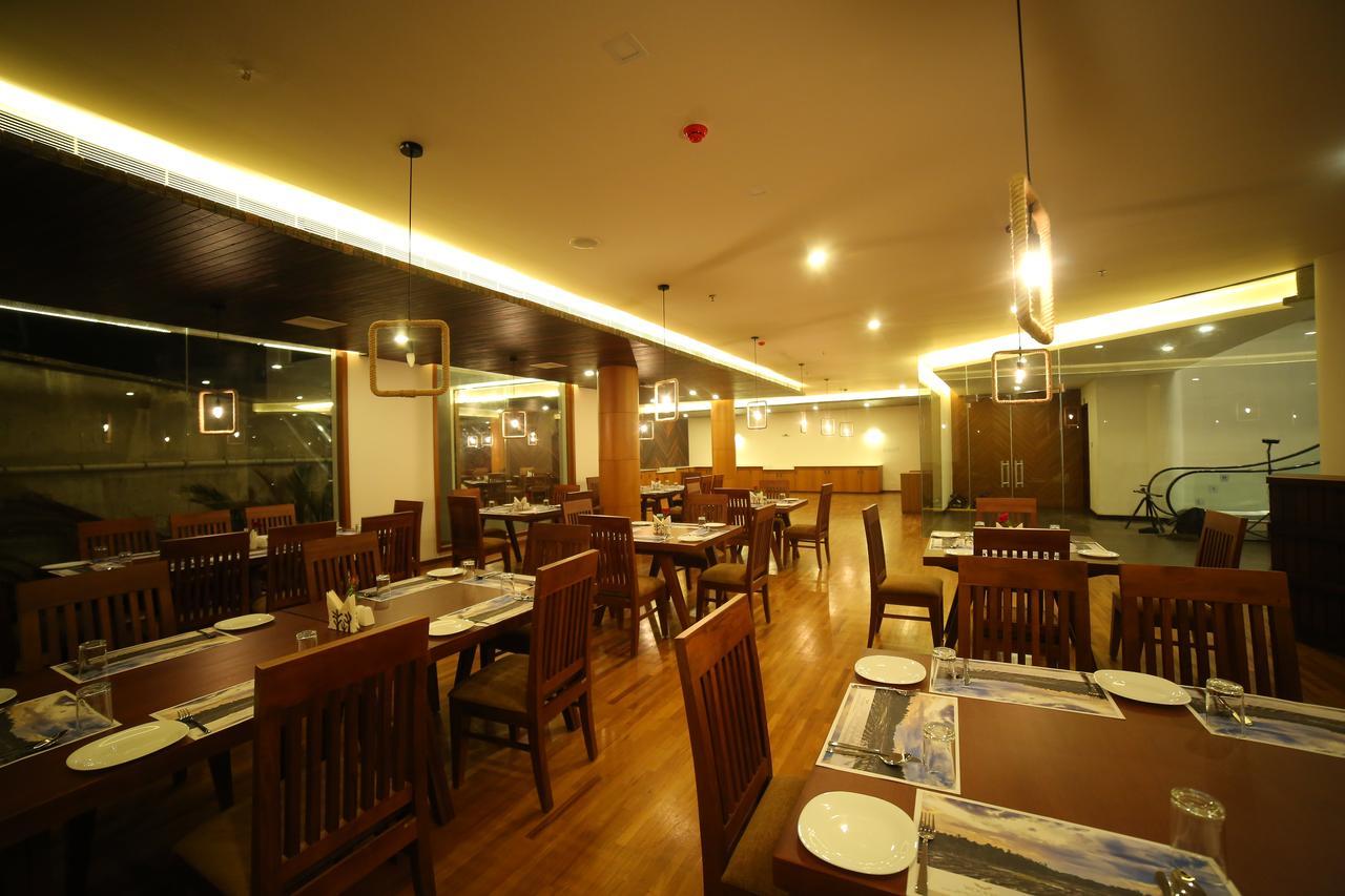 Woodies Bleisure Hotel โคชิโคด ภายนอก รูปภาพ